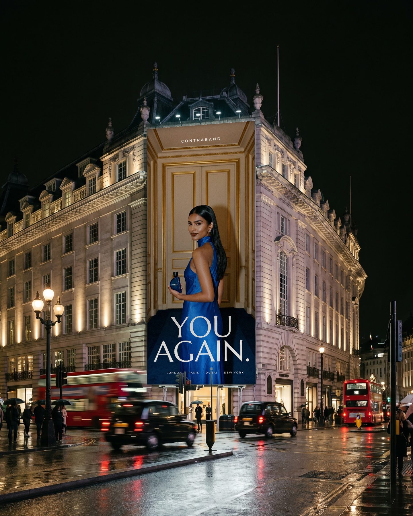 A building wrap on a West End corner at night shows the Paris corridor frame with YOU AGAIN. set in white.